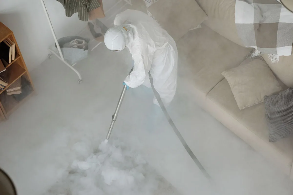 Biohazard cleanup technician in protective equipment, Penn Yan, NY